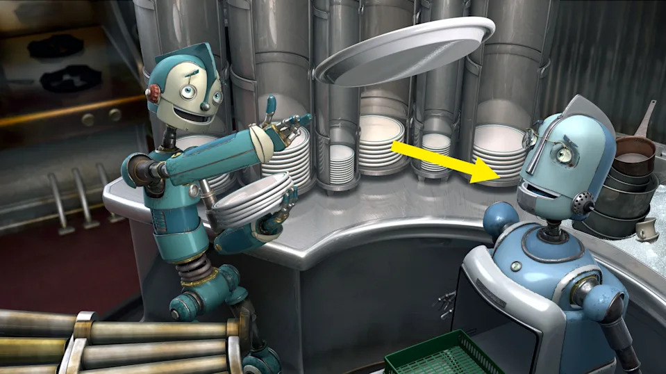 Dos robots animados en una cocina, uno entregándole un plato al otro. Parecen estar involucrados en una interacción amistosa.