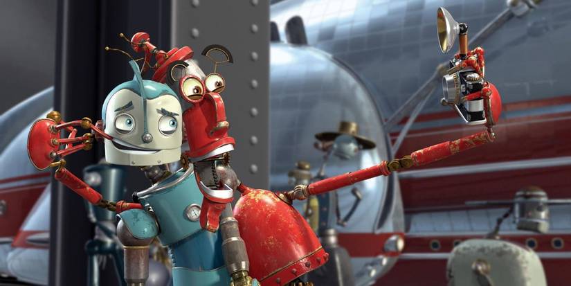 Rodney Copperbottom y Fender Pinwheeler toman una foto de la película Robots
